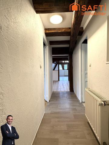 Superbe appartement de 4 pièces disposant d'une cave et d'une place de stationnement couverte !