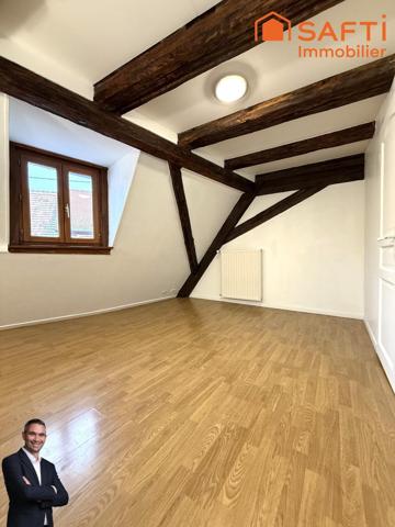 Superbe appartement de 4 pièces disposant d'une cave et d'une place de stationnement couverte !