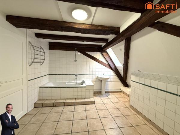 Superbe appartement de 4 pièces disposant d'une cave et d'une place de stationnement couverte !
