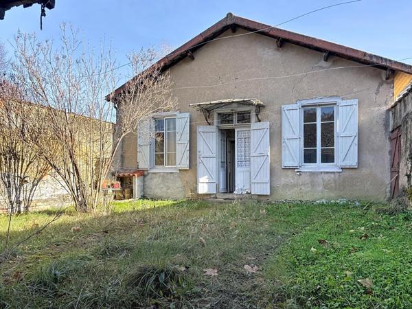 Plain pied spacieux à rénover avec jardin attenant