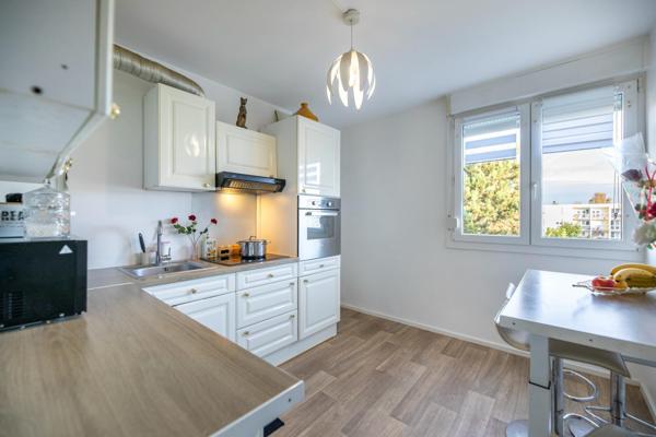 Appartement T3 avec balcon, cave et garage