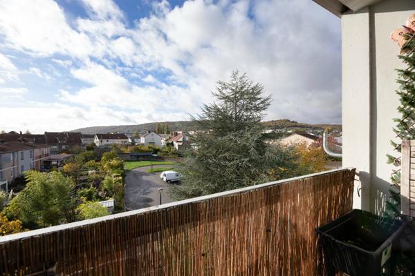 Appartement T3 avec balcon, cave et garage