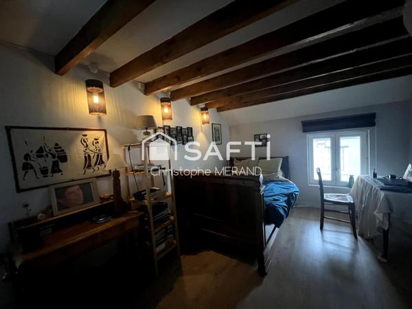 Deux maisons dans le centre de DANGE SAINT ROMAIN