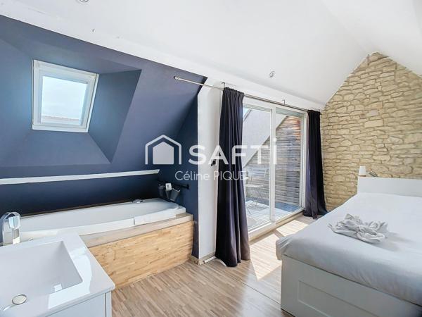 Maison de ville rénovée avec terrasse et balcon