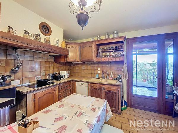 A Vendre en Viager Occupé Maison de 134 m² avec garage, dépendances et parc arboré d'environ 2 700 m²