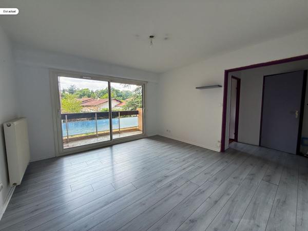 Appartement + cave + stationnement extérieur