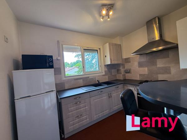 Appartement + cave + stationnement extérieur