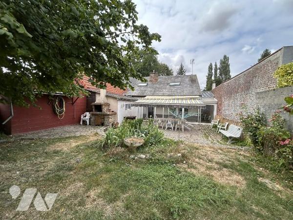 maison individuelle avec jardin et garage