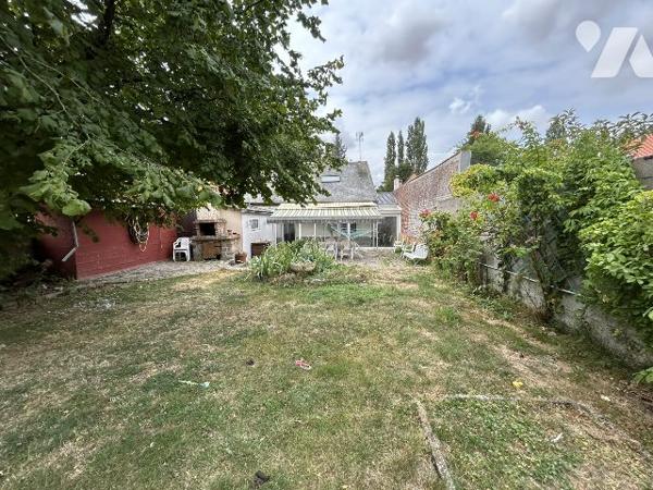 maison individuelle avec jardin et garage