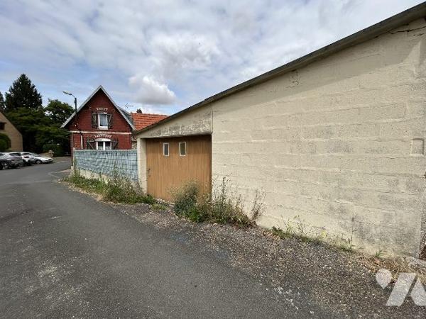 maison individuelle avec jardin et garage