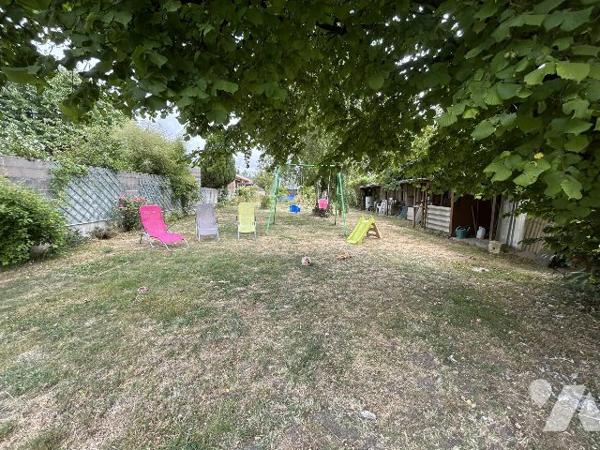 maison individuelle avec jardin et garage