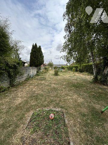 maison individuelle avec jardin et garage