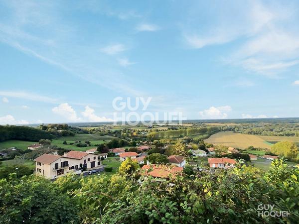 Immeuble de rapport centre-ville Mugron avec maison et local commercial