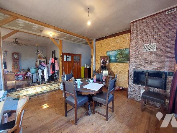 SAINT-GAUDENS, maison de ville avec jardin clôturé et garage proche des commodités à pieds.