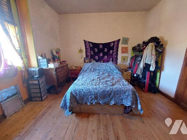 SAINT-GAUDENS, maison de ville avec jardin clôturé et garage proche des commodités à pieds.