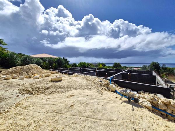 Marie Galante - Terrain de 1 611m² vue mer avec maison en construction