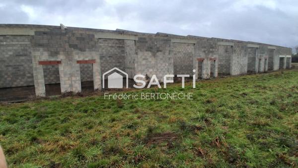 Batiment industriel non fini implanté en zone industrielle dynamique.