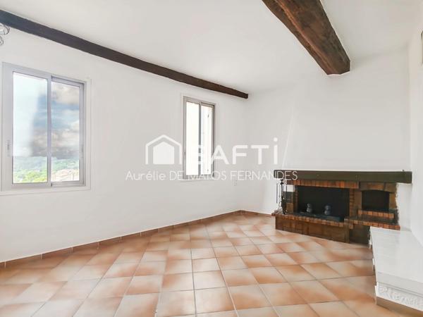 Appartement 70m2, beau potentiel, lumineux, cave