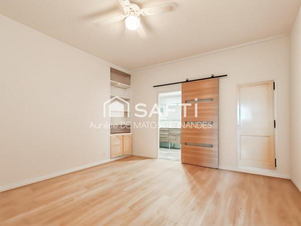 Appartement 70m2, beau potentiel, lumineux, cave