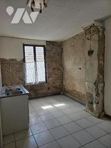 SOMAIN GROUPE DE 2 MAISONS A RENOVER