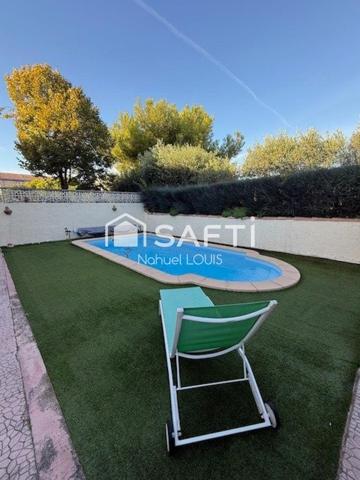 Maison coup de cœur avec jardin fleuri et piscine