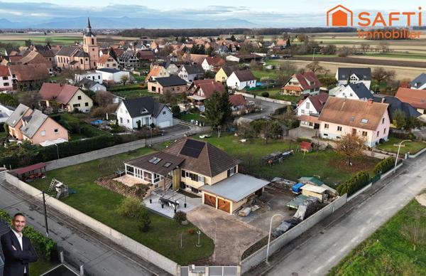 Superbe maison de 7 pièces sur 16.11 ares de terrain, quartier calme et résidentiel.