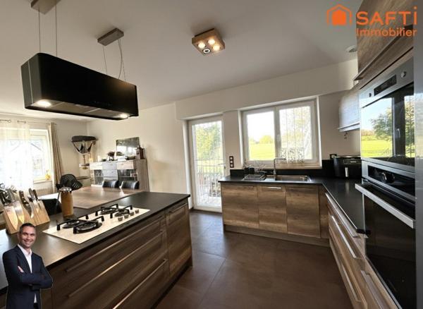 Superbe maison de 7 pièces sur 16.11 ares de terrain, quartier calme et résidentiel.