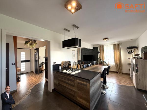 Superbe maison de 7 pièces sur 16.11 ares de terrain, quartier calme et résidentiel.