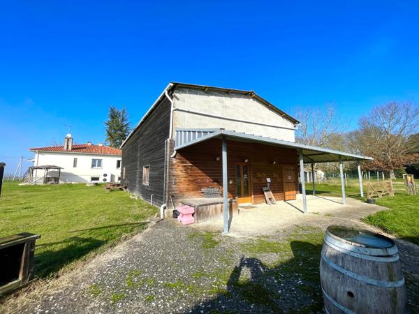 Maison 7 pièces sur propriété équestre de 2.3Ha