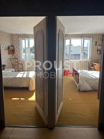 En exclusivité Quartier Souché maison de 115 m² environ avec garage.