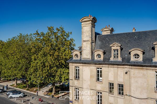 Coeur de ville – studio contemporain en dernier étage