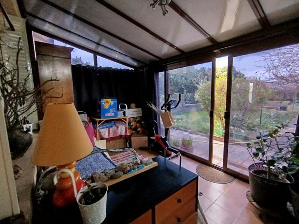 Issoire(63), VIAGER OCCUPE, maison plain pied de 90m2, véranda sur 370 m2 de terrain