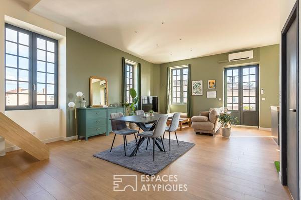 Duplex rénové avec balcon dans une bâtisse