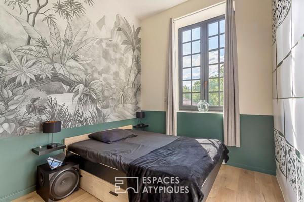 Duplex rénové avec balcon dans une bâtisse