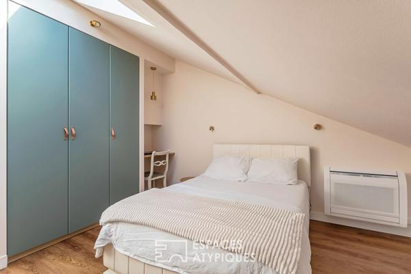 Duplex rénové avec balcon dans une bâtisse