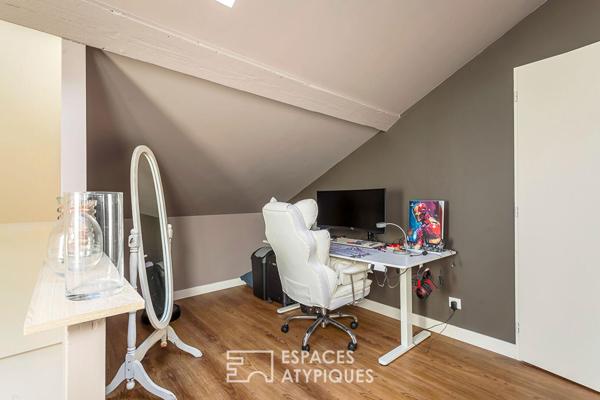 Duplex rénové avec balcon dans une bâtisse