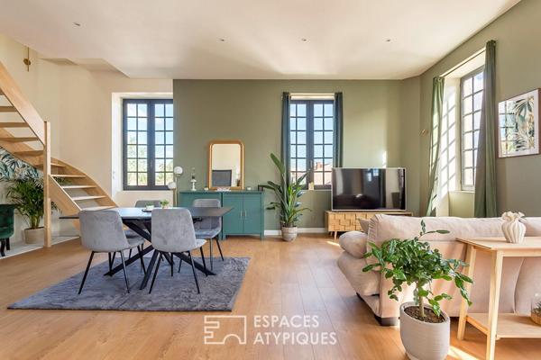 Duplex rénové avec balcon dans une bâtisse