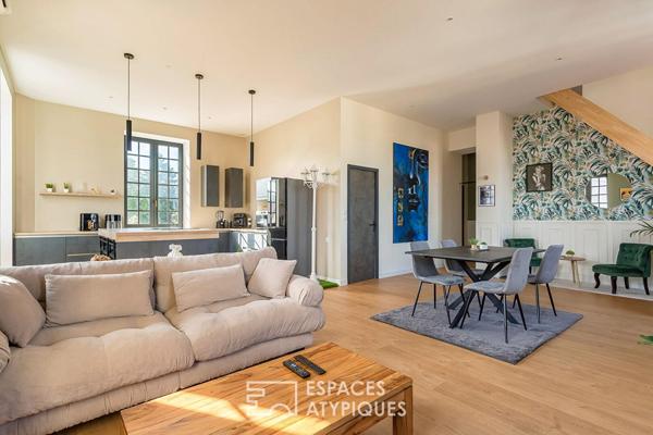 Duplex rénové avec balcon dans une bâtisse