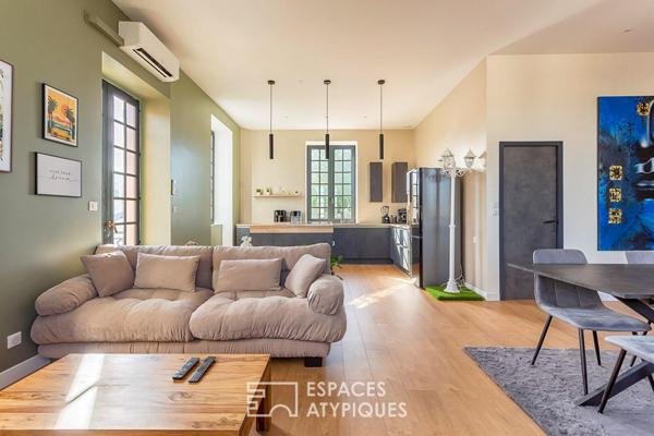 Duplex rénové avec balcon dans une bâtisse