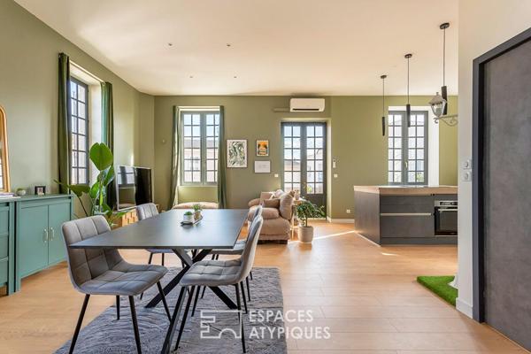 Duplex rénové avec balcon dans une bâtisse