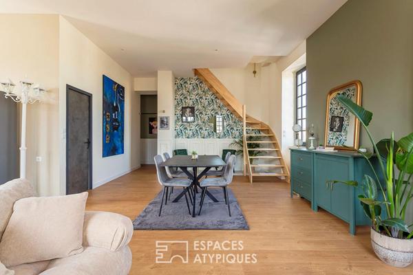 Duplex rénové avec balcon dans une bâtisse