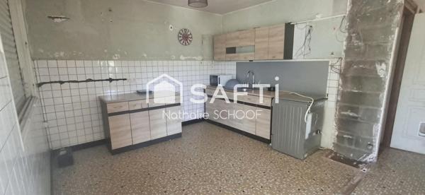 À vendre – Maison à rénover avec beau potentiel à Baud