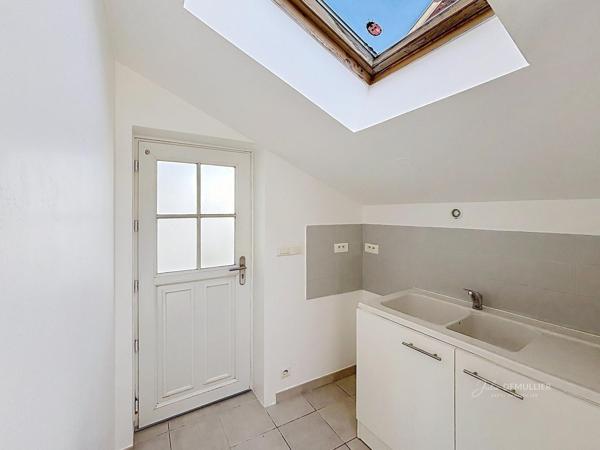 Maison de plain pied avec combles semi aménagés