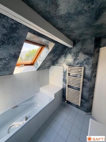 Maison d’architecte traditionnelle construite dans les années 80