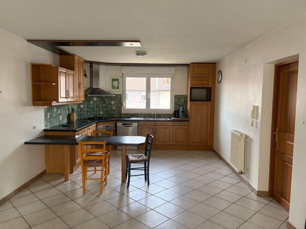 Maison de type appartement avec balcon