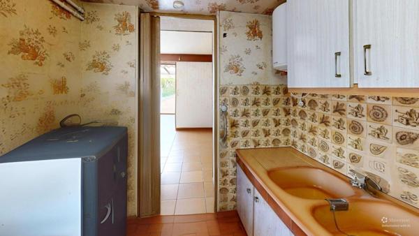Maison avec dépendances et terrain constructible à Toury