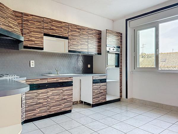 Immeuble à vendre à Briec - local commercial loué et appartement T4 loué avec cave