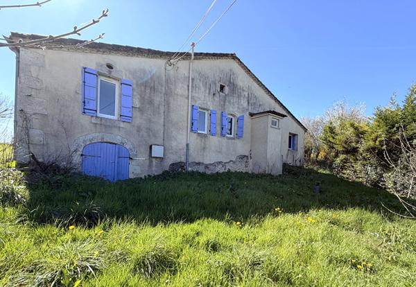 LAROQUE TIMBAUT - Maison en pierre de 123 m² avec 3 chambres et dépendance sur terrain clôturé d'environ de 930 m²