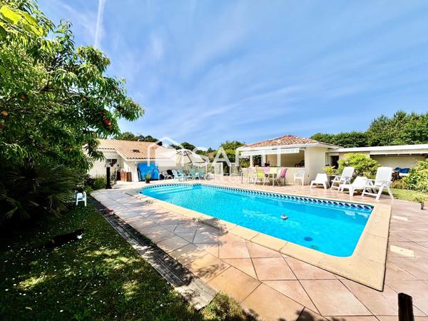 Maison 4 chambres , piscine , beau jardin , garage
