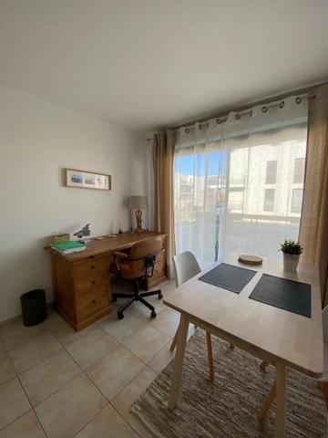 2 pièces - balcon - place de parking en sous-sol